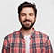 Avery Thompson YouTube creator sharing experience with AI video generator
